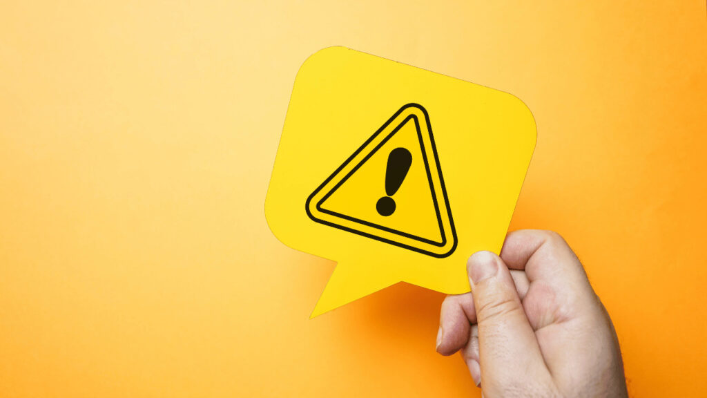 危険マークが書かれたメモ