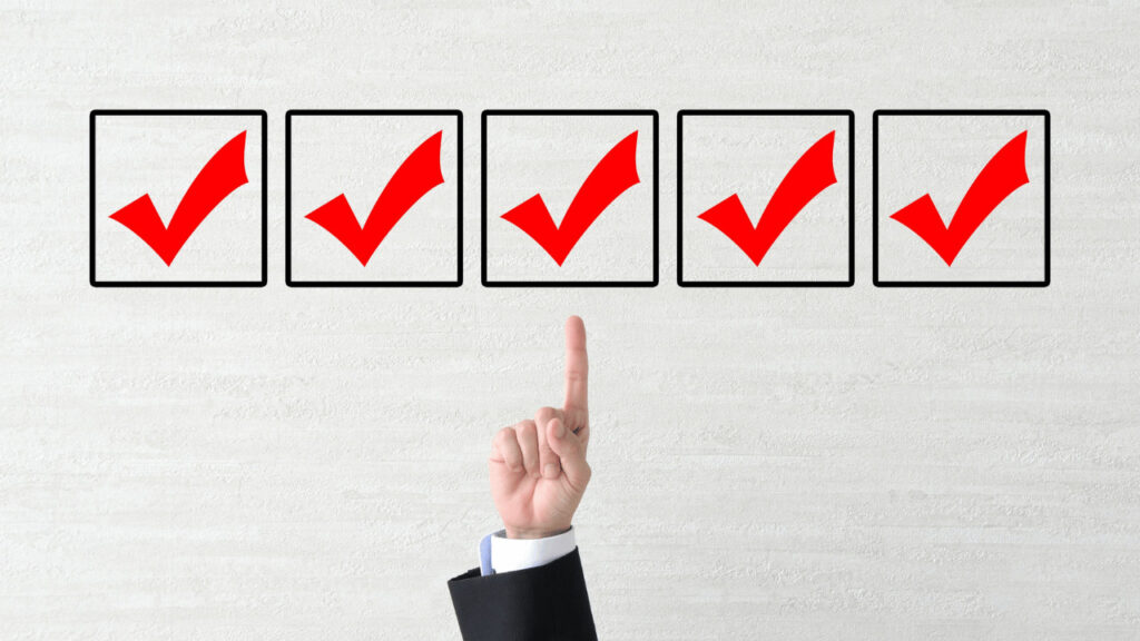 人の手とチェックボックス